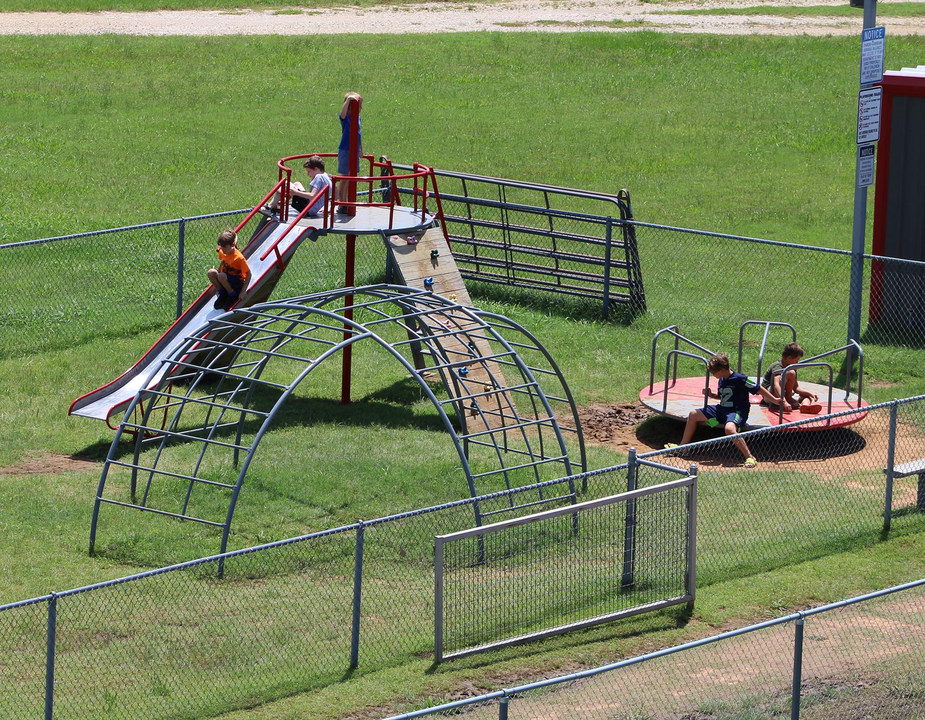 Playground at Sharkarosa Zoo with children playing.